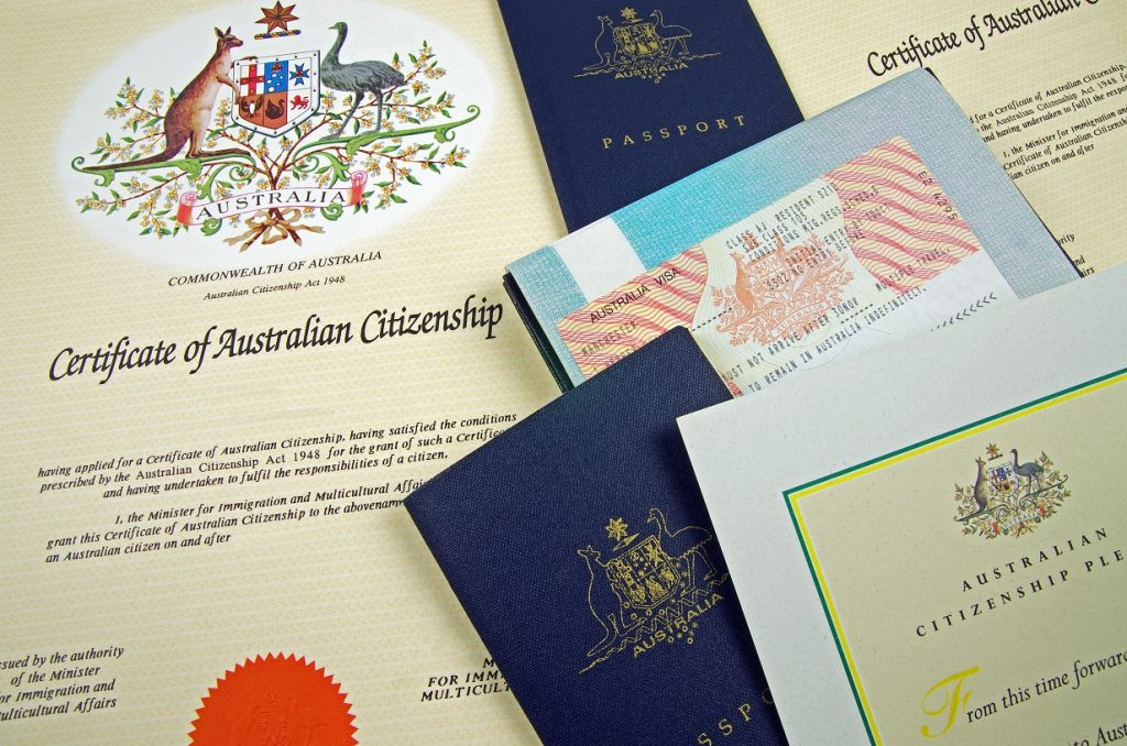 Close up of Australian Southern Cross flag with Australian passport for Australian travel event